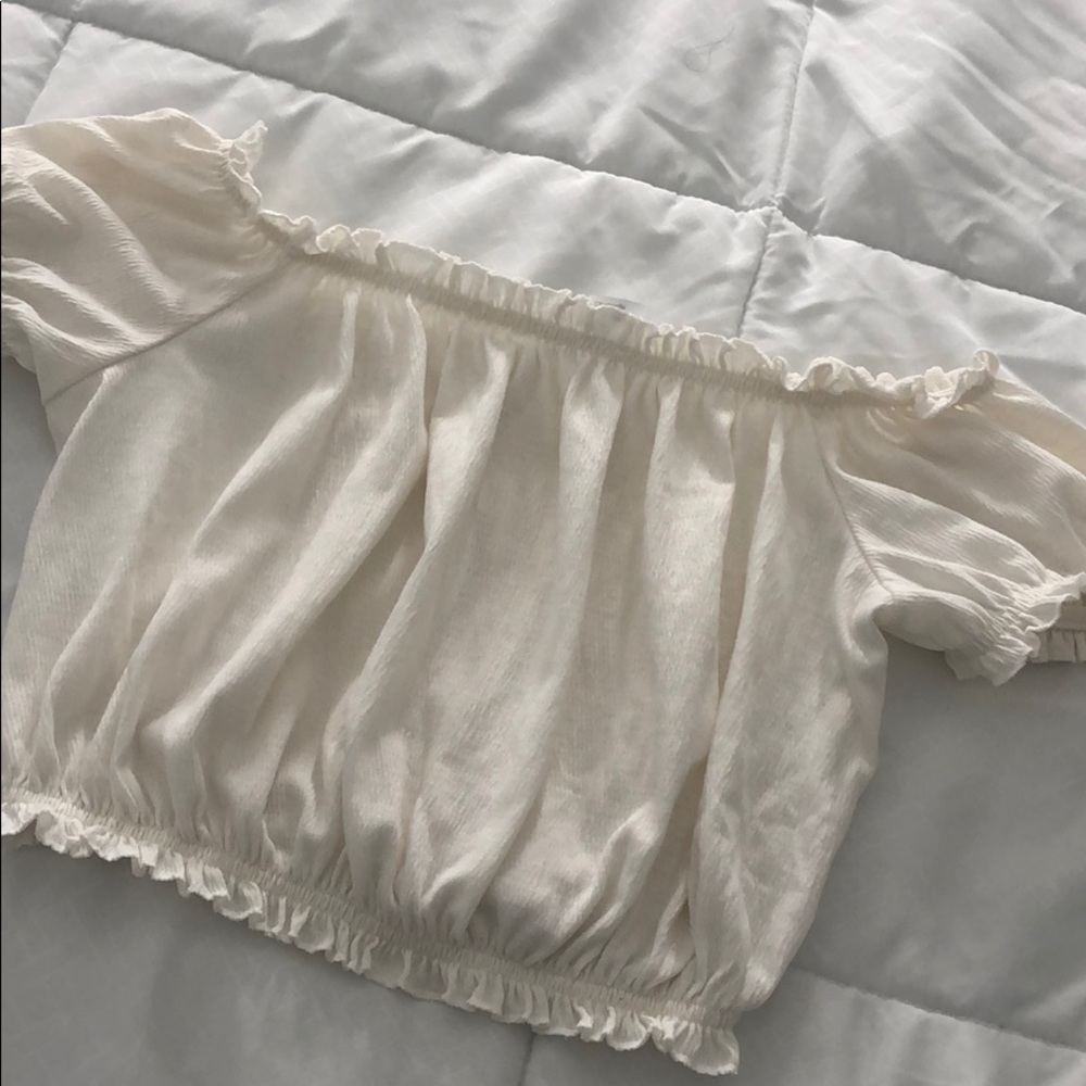 Cream off the shoulder ruffled crop top!